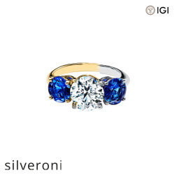 Three Stone Engagement Ring with Sapphire Side Stones in Platinum - Silveroni